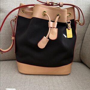 Dooney and Bourke Cabriolet Canvas Leather Large Drawstring Bucket Bag Brown